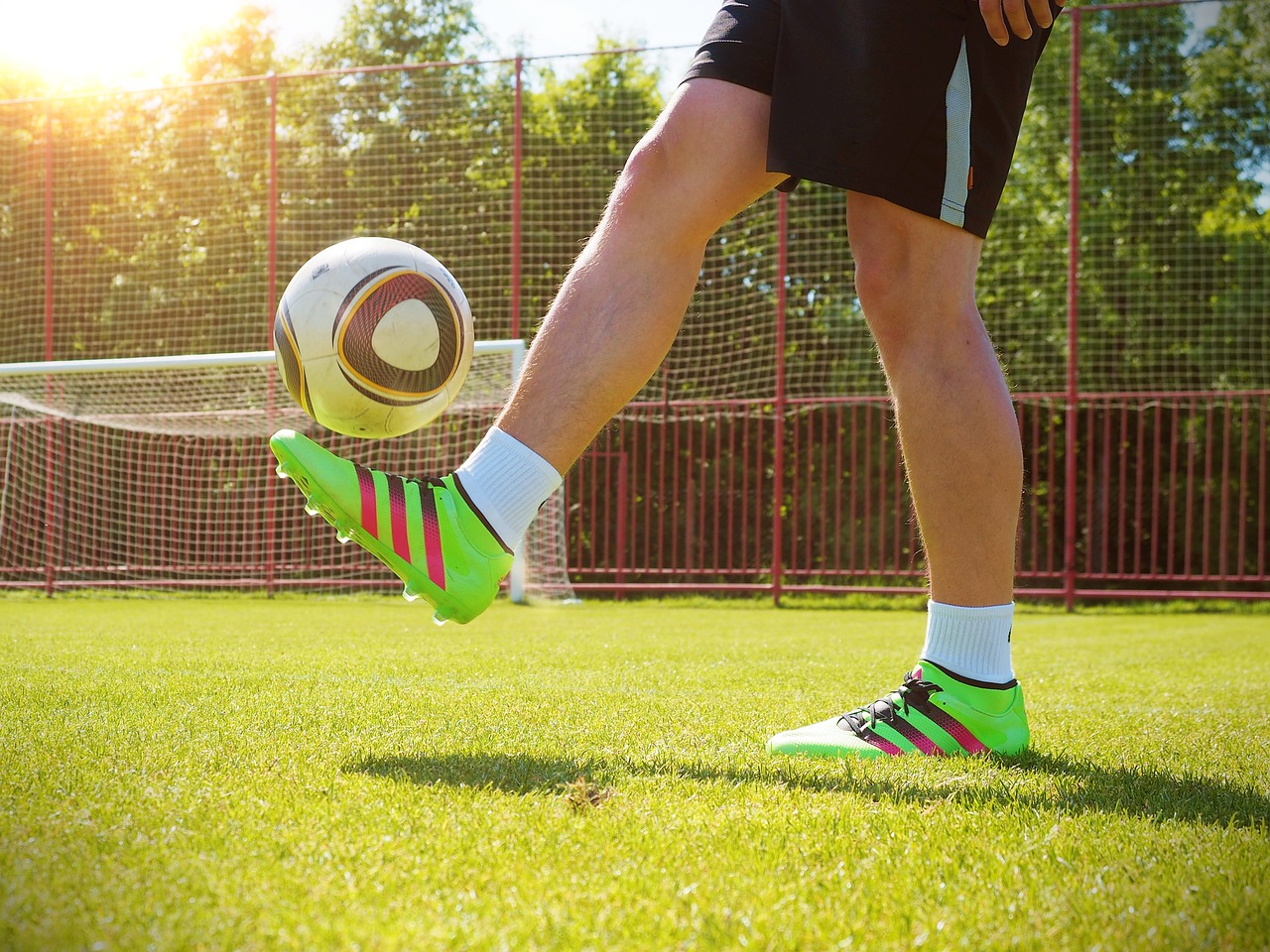 A Kid Playing Soccer For Skill Development